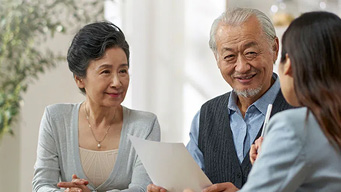 An elder couple meeting with an consultant